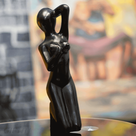 Picture of Black Abstract kneeling Female Carving